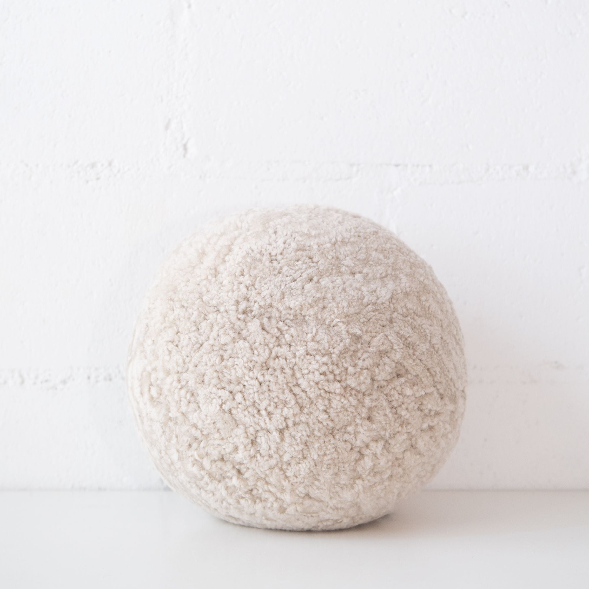 Angelite Round Curly Sheepskin Cushion in Pearl, from Natures Collection